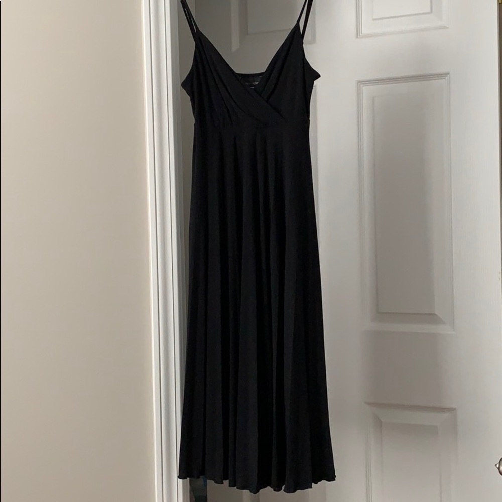 XS little black dress with accordion style flare